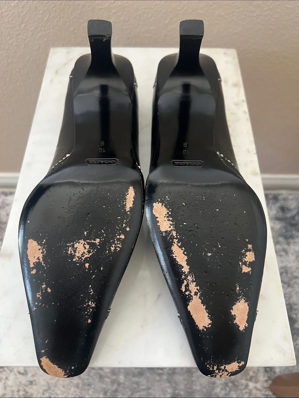 Coach Black Leather Pointed Toe Heels with Metallic Accent